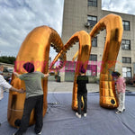 inflatable golden tentacles used as ceiling decorations