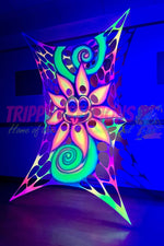 Funky psychedelic neon flower wall hanging that glows under blacklight for trippy spaces
