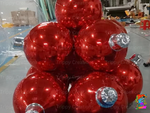 large inflatable christmas baubles hanging from ceiling decor