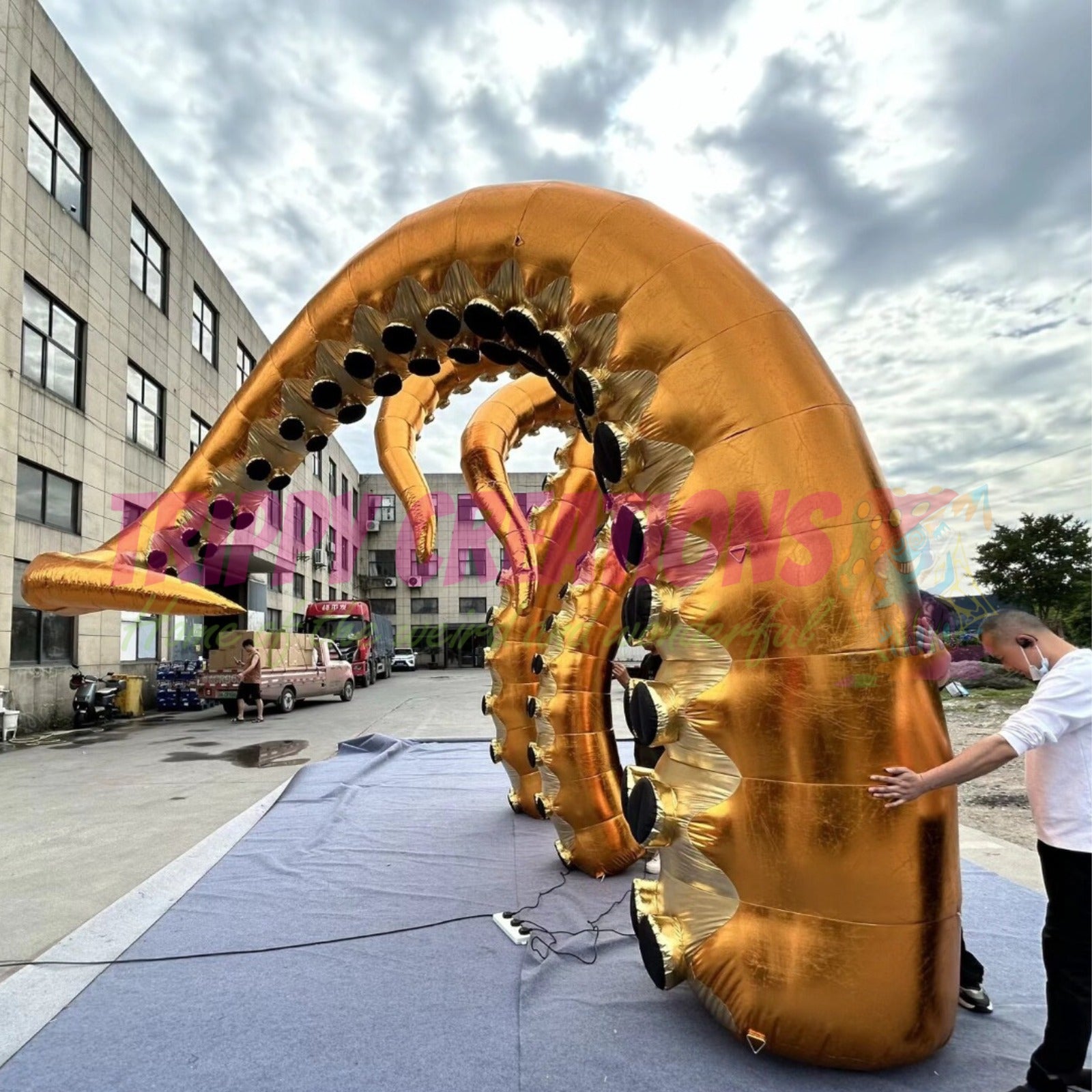 Metallic gold inflatable tentacles for party venues, outdoor installations and themed events