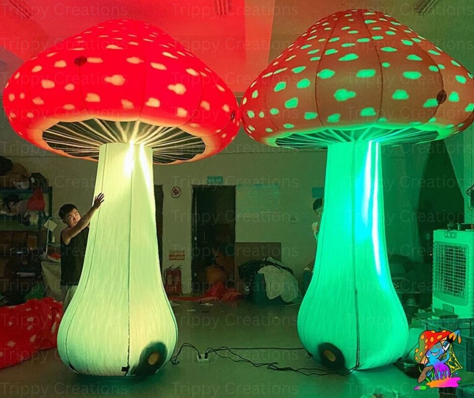 Inflatable mushroom lights in a room setting with visible branding.