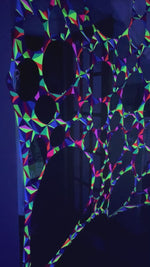 Trippy UV neon tapestry hire for large event backdrops