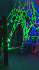 Psychedelic green UV props for hire for themed parties