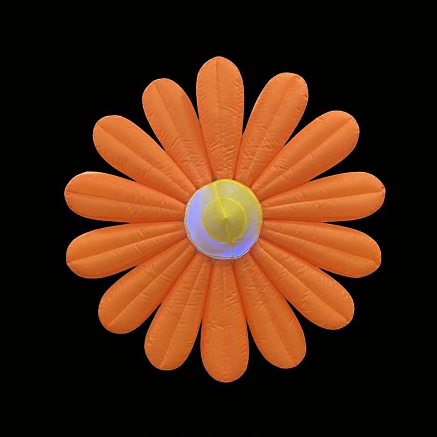 Trippy Creations giant orange inflatable daisy flower decoration with LED lights and yellow center, made of polyester taffeta.