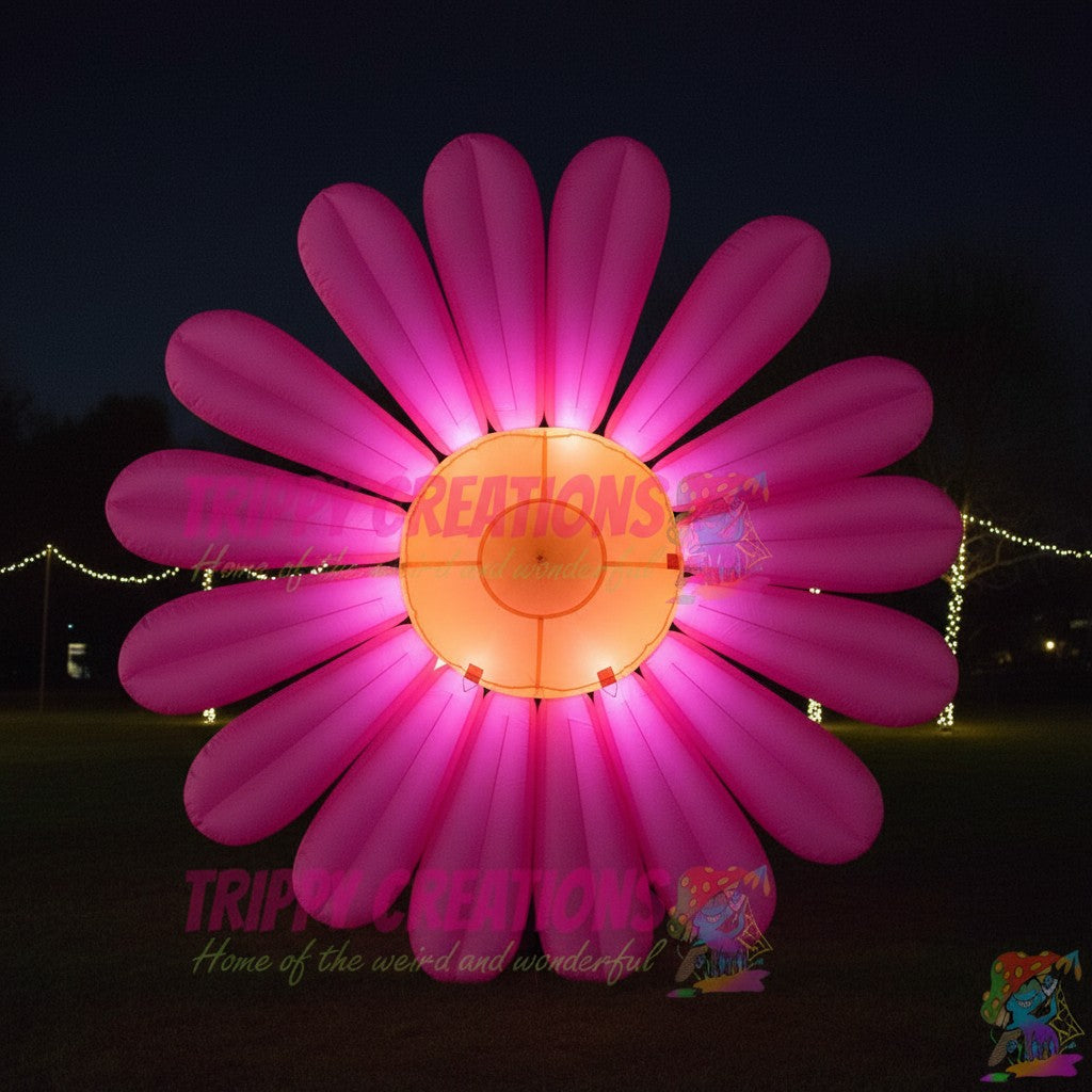 Trippy Creations giant pink inflatable daisy flower decoration with orange center, polyester taffeta, for events.