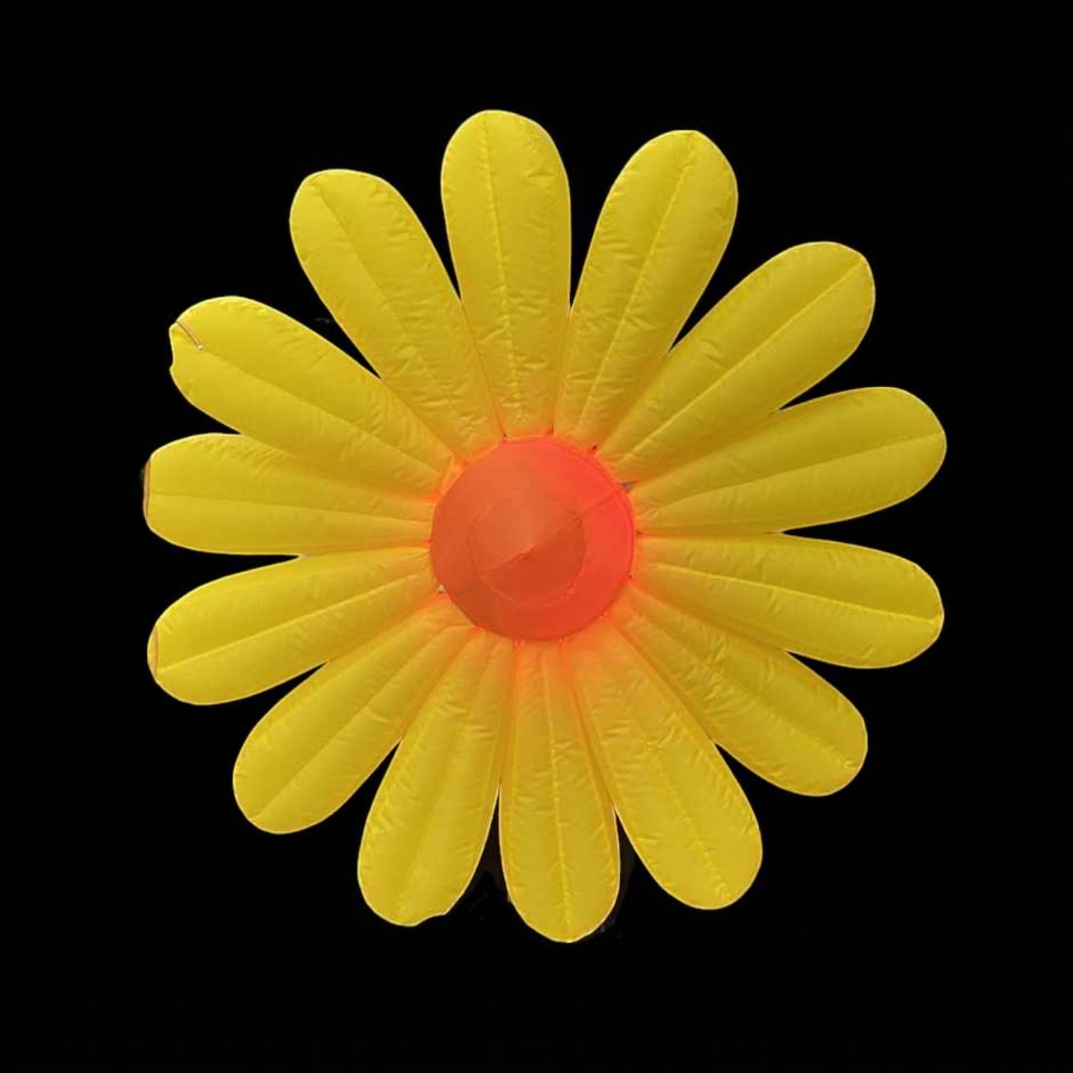 Trippy Creations giant yellow inflatable daisy flower decoration with orange center, made of polyester taffeta.