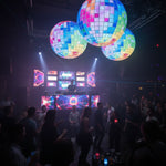 Trippy Creations giant inflatable disco balls with LED lights, perfect for parties and events.
