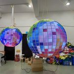 Trippy Creations giant inflatable disco ball decoration with rainbow LED lights, perfect for parties and events.