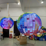 Trippy Creations giant inflatable disco ball decoration with rainbow LED lights, perfect for parties and events.