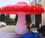 Trippy Creations giant red and white inflatable mushroom decoration with LED lights, perfect for parties.