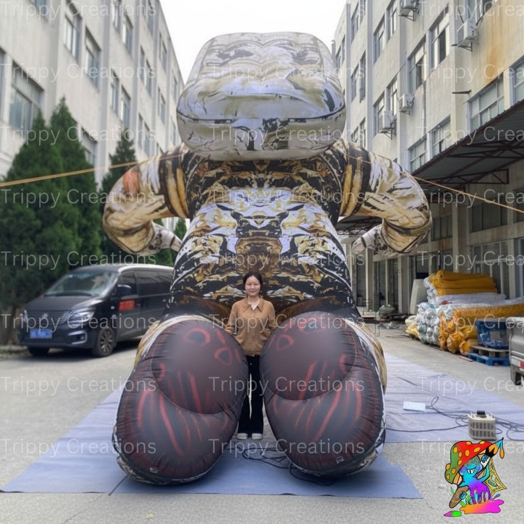 Trippy Creations giant inflatable astronaut with LED lights, gold and brown camouflage pattern, standing upright.