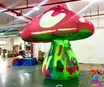 Trippy Creations Giant Pink Fairy Mushroom Inflatable decoration with green stem and whimsical designs. Oxford fabric.