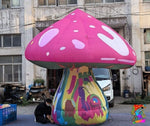 Trippy Creations giant pink inflatable mushroom with white polka dots and psychedelic stem, Oxford fabric, 3.5m tall.