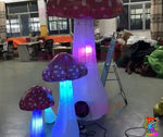 Trippy Creations set of 5 mini LED inflatable mushrooms, red and white toadstool style, for parties and festivals.