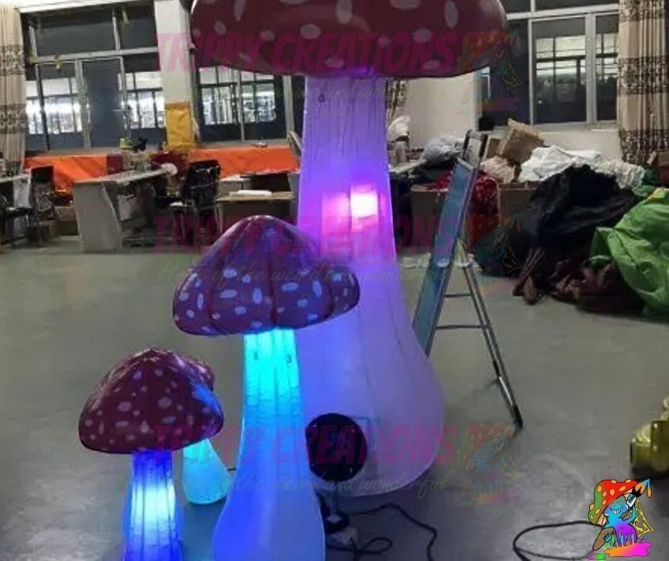 Trippy Creations set of 5 mini LED inflatable mushrooms, red and white toadstool style, for parties and festivals.