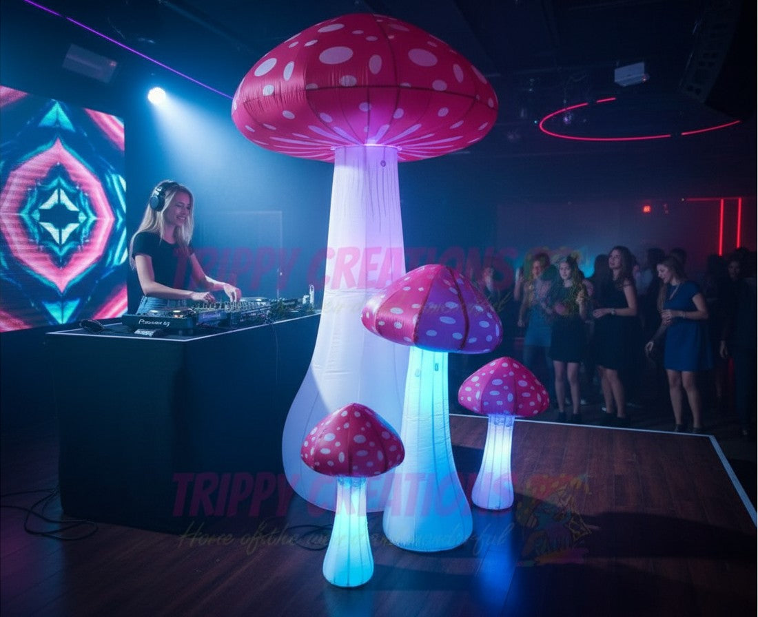 Trippy Creations set of 5 red and white inflatable mushrooms with LED lights, perfect for parties and festivals.