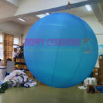 Trippy Creations large blue inflatable planet, perfect for space-themed events and hanging installations.