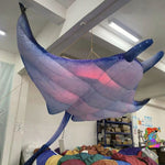 Trippy Creations 3m inflatable stingray decoration in blue and white with pink internal lighting, designed for hanging events.