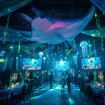 Trippy Creations 3m inflatable stingray decoration in blue and white with pink internal lighting, designed for hanging events.