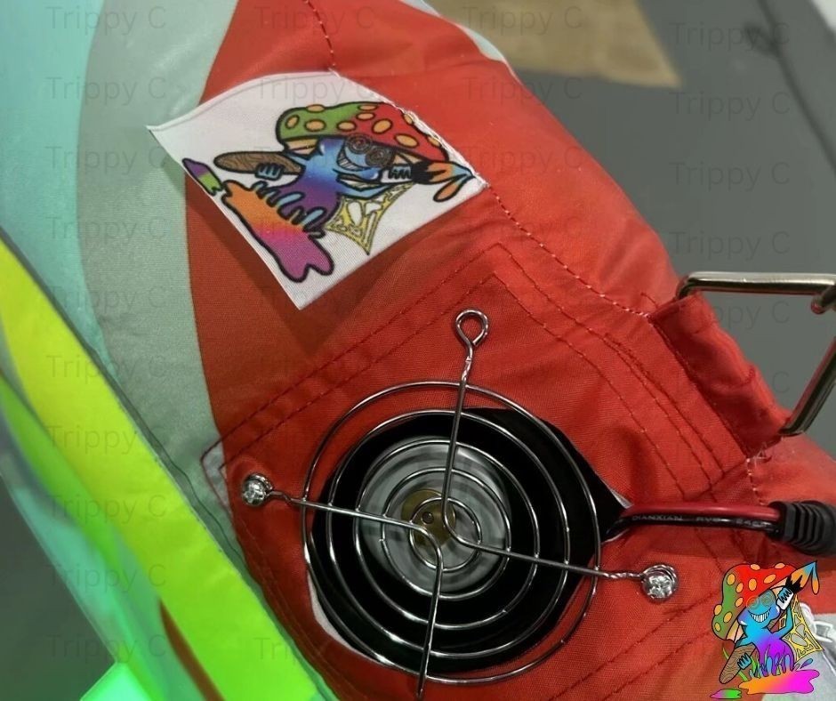 Trippy Creations LED inflatable mushroom prop with psychedelic mushroom patch and built-in fan.