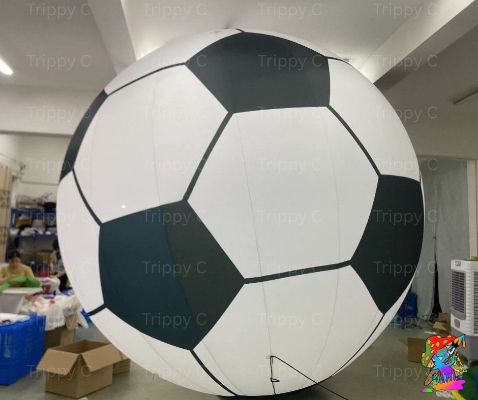 Large outdoor inflatable football for parties and sports days