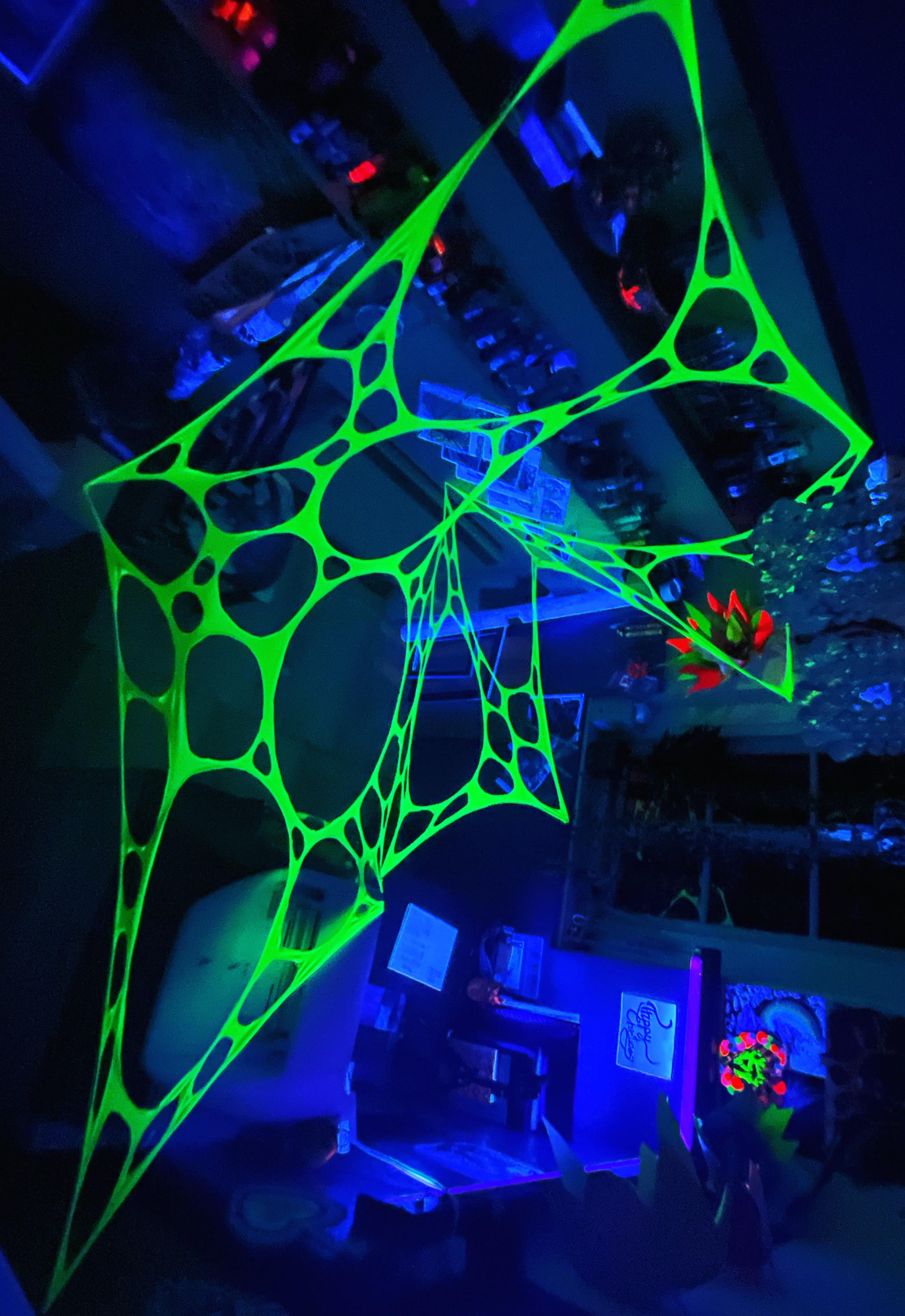 UV Reactive green polka dot event decorations.
