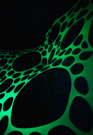 UV Reactive green polka dot event decorations.