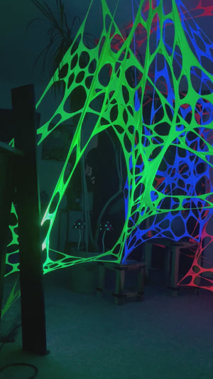 UV Reactive green polka dot event decorations.